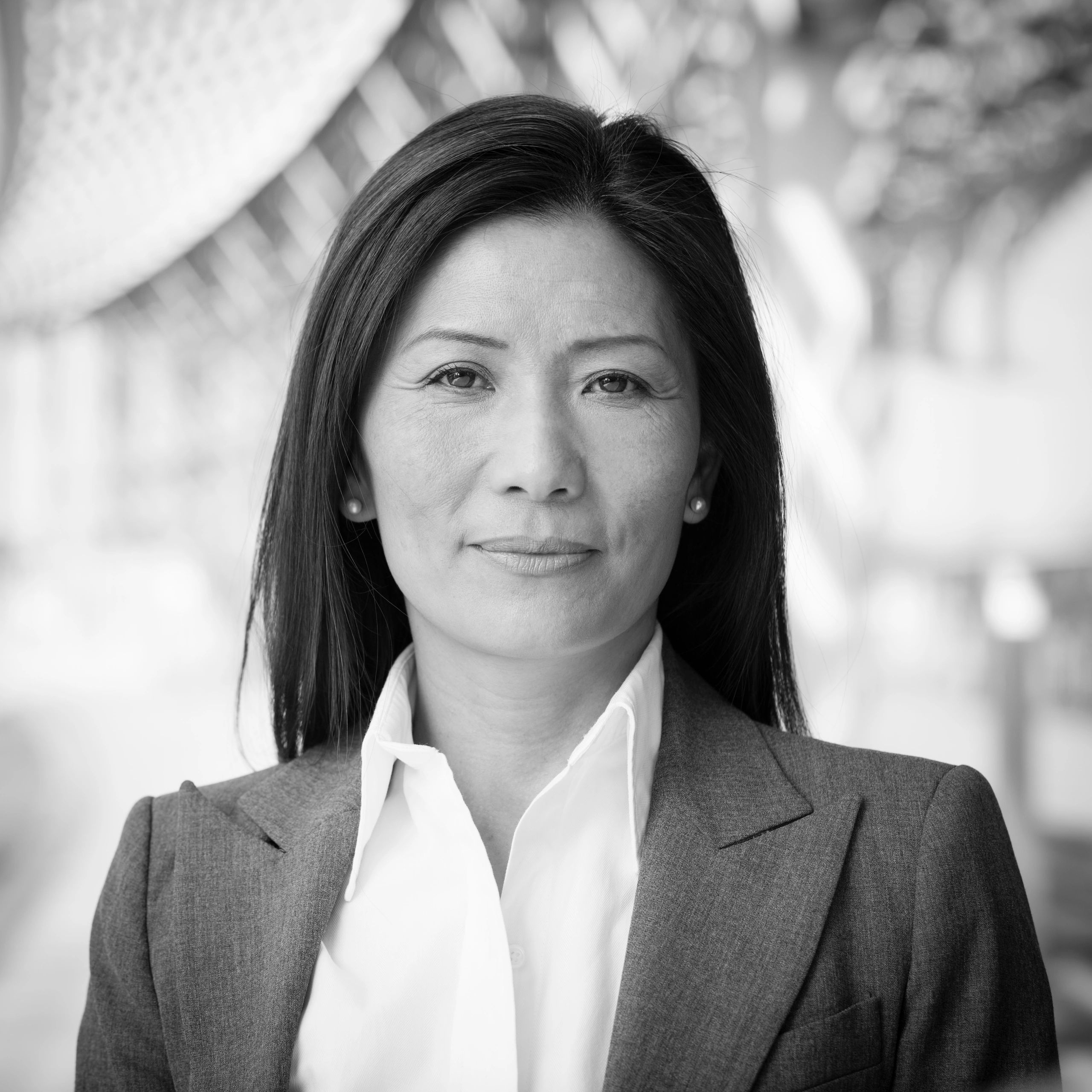 Professional headshot of a business executive