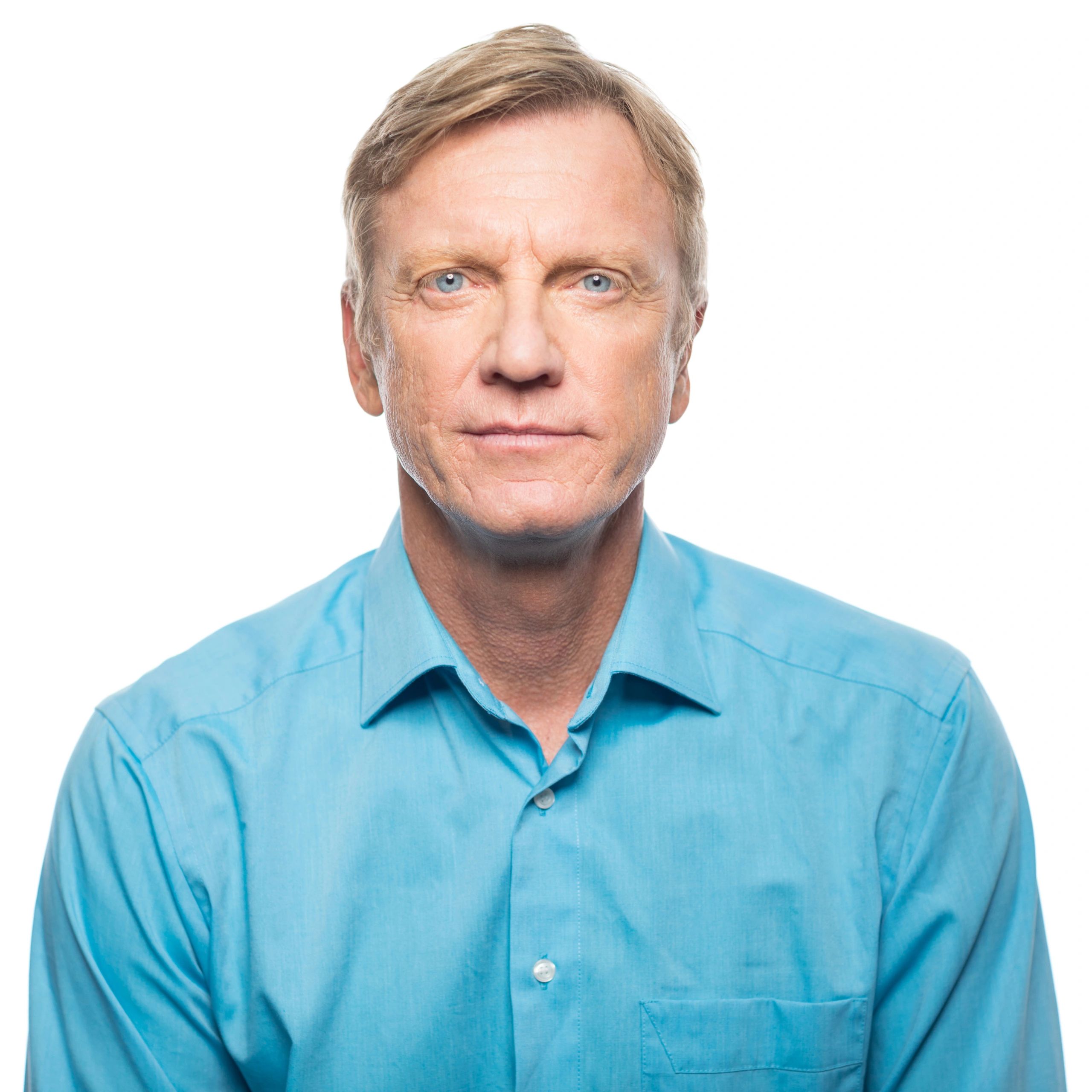 Professional headshot of a business executive
